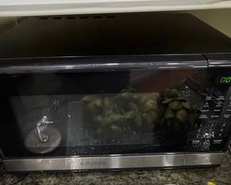 BLACK DECKER . cu. ft. W Stainless Steel and Black Digital Microwave Oven