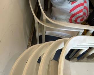 White Molded Plastic Stackable Armchairs each fourth image