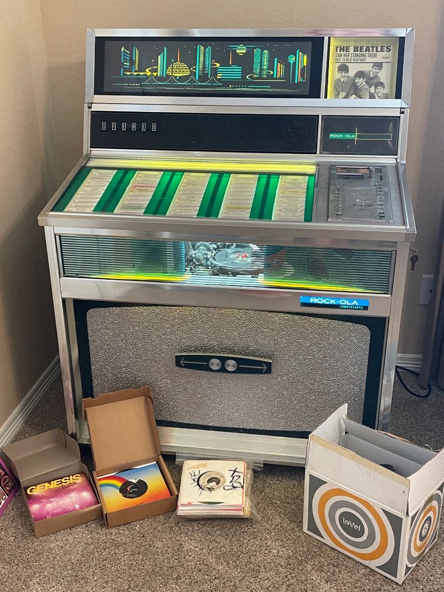 Plays 45s, can load multiple choices, coin collector disengaged