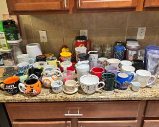 Disney and other assorted coffee mugs