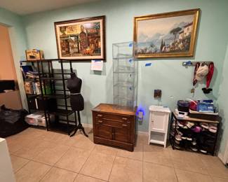 Bookcases, dress form, shoe boxes, paintings