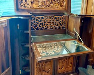 Vintage Chinese hand carved dry bar / liquor cabinet - opens up showing more intricate carvings, mirror shelf drops down, sides open up 