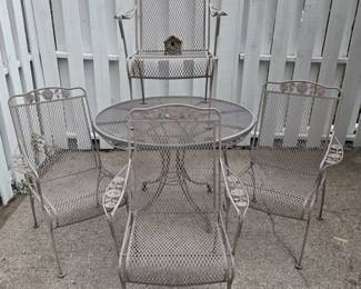Vintage Woodard wrought iron patio set, table & 4 chairs.