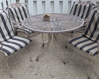 Vintage Woodard wrought iron patio set, table & 4 chairs.