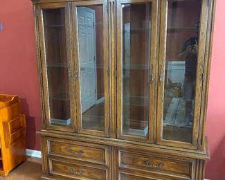 breakfront china cabinet.  All wood.  made by 'White Fine Furniture'.  very heavy.. glass doors.  top can be removed for moving.