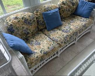 Vintage White Wicker ThreeSeater Sofa with Floral Cushions