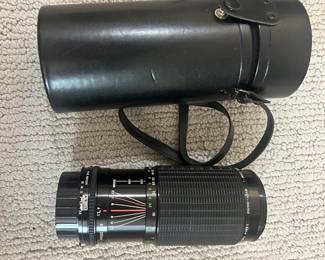 LOT 23 A Sigma High Speed 80-200MM Telescopic Lens with Case. Starting BID $20.00