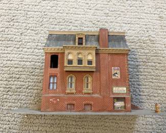 LOT 62. A Hand Constructed HO Scale Brick Residence and Cleaners.. Starting Bid $50.00