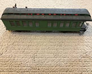 LOT 83. A Painted Metal Passenger Car. Starting Bid $60.00