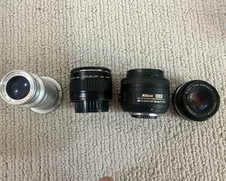 LOT 25 A Group of Five Lenses to include a) German Steinheil Caeser 105MM b) A Tokina Doubler c) A Nikon DX AF-S Nikkor 35MM Lens d) A Nikon Series E 50MM Lens e) A Nikon Series E Zoom 72MM Lens. Starting BID $200.00