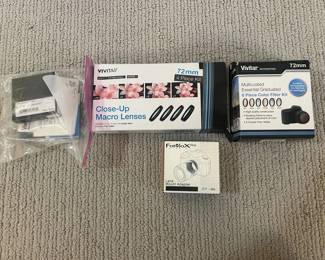 LOT 28 A Group of Miscellaneous Objects to Include Close UP Macro Lenses Filter Kit and Adaptors. Starting BID $35.00