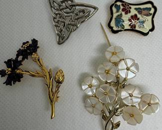 Assorted Vintage Brooches: Celtic Knot, Enamel Floral, and Faux Pearl Floral Designs