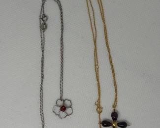 Two Necklaces: Flower Pendant with Red Stone and Garnet Cross Pendant