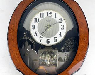 Small World Rhythm Wall Clock, Powers On 
