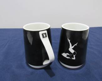 Pair of ceramic Playboy mugs with The Femlin logo