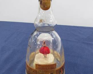 Old Bols ballerina bottle with working music box and dancer