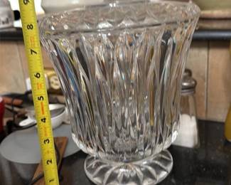 Orrefors Clear Crystal Bowl — This Orrefors hand-signed clear crystal bowl (etched with number 4381-121) is a decorative centerpiece-quality piece from the Swedish maker. The bowl features a sculptural, petal-like rim and thick crystal construction with crisp, faceted detail that catches light beautifully. Measuring approximately 8 in across and about 4.5 in tall, it is substantial enough for candy, potpourri, or as a small centerpiece. In good condition with no visible chips or cracks; hand-signed mark and etched number noted on base.