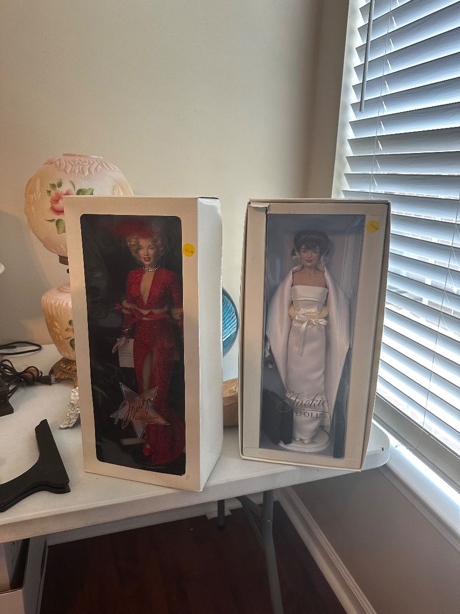 Porcelain Marilyn Monroe and Jackie O dolls
