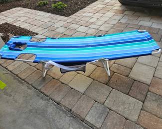 Like new three section folding beach chair. $25