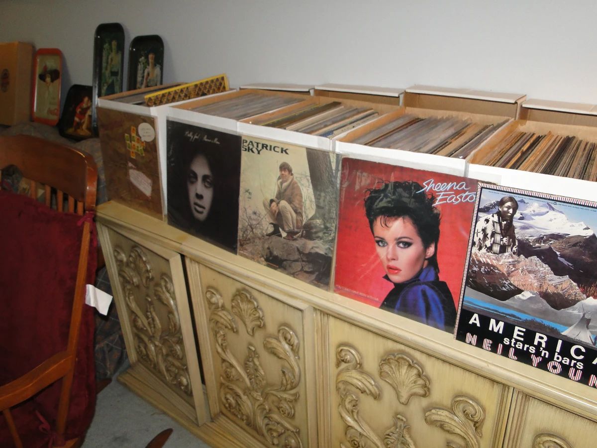 Boxes and boxes of Records! Sitting on a vintage Stereo