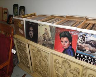 Boxes and boxes of Records! Sitting on a vintage Stereo