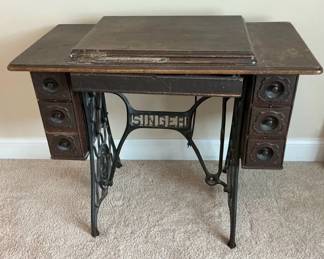Singer Treadle Sewing Machine Cabinet with Vintage Sewing Patterns