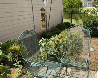 Metal Mesh Patio Chairs and Shepherd Hooks with Bird Feeder and Wind Chime