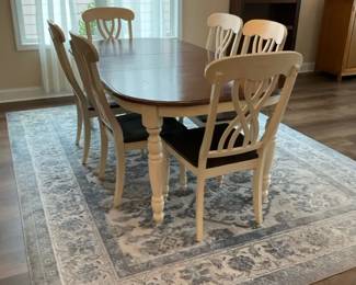 Two Tone Dining Table Six Chairs and Bazaar Elegance Area Rug