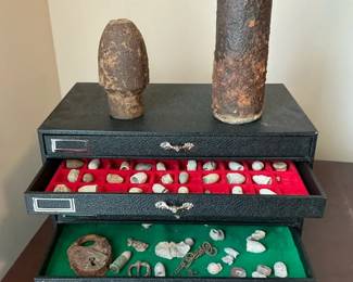 Display Case with Fossils Relics and Inert Projectiles