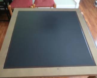 table flips over to be one half the size