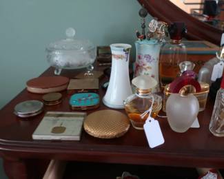 compacts, perfume bottles, hat pin holders