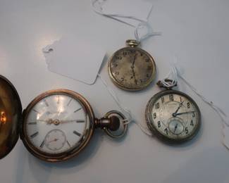 Elgin on the left lower right Illinois pocket watch other watch