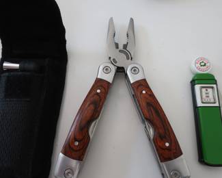 folding pliers and a knife in the gas pump
