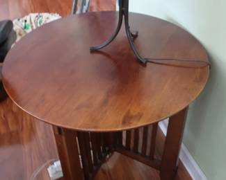 one of two round lamp tables