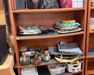 Wooden Bookshelf with Assorted Decor including Decorative Ducks