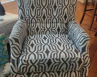 PRESALE - $25 due to some discoloration and wear upon closer inspection.(CURRENTLY LIST AT CROWLEY FOR $999)Swivel Chair with Flared Back and Sloped Arms Caboose Collection by England.Dimensions: 31" W × 37" D × 40" H.his club styled swivel chair offers simple design and comfort for your living room. The plush stitched pillow back of the chair along with the reversible welted cushion create a comfortable seating option.