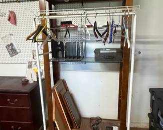 Retail Display Shelving Unit with Integrated Garment Rack and Lighting