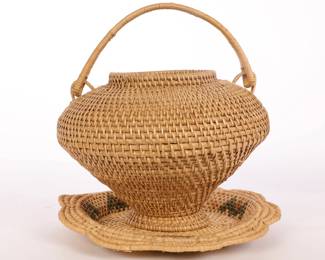 A PAIR OF FINE WOVEN RATTAN OR CANE BASKETS