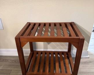Simple, timeless, and incredibly versatile, this solid wood slatted accent table works beautifully as an end table, plant stand, bedside table, or lanai accent piece. The open two-tier design provides extra storage while complementing coastal, cottage, and casual Florida décor. A great addition for Villages homes where functional, quality wood furniture is always in demand.