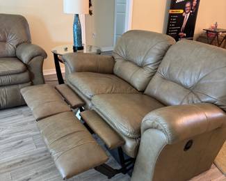 Relax in legendary La-Z-Boy comfort with this matching genuine leather reclining living room set. The collection includes a dual reclining sofa and a dual reclining loveseat, both featuring smooth manual reclining mechanisms, plush pillow-top arms, supportive high-back cushions, and generously padded seating.