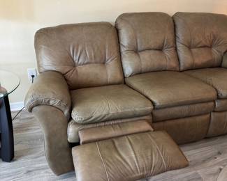 Relax in legendary La-Z-Boy comfort with this matching genuine leather reclining living room set. The collection includes a dual reclining sofa and a dual reclining loveseat, both featuring smooth manual reclining mechanisms, plush pillow-top arms, supportive high-back cushions, and generously padded seating.