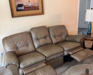Relax in legendary La-Z-Boy comfort with this matching genuine leather reclining living room set. The collection includes a dual reclining sofa and a dual reclining loveseat, both featuring smooth manual reclining mechanisms, plush pillow-top arms, supportive high-back cushions, and generously padded seating.