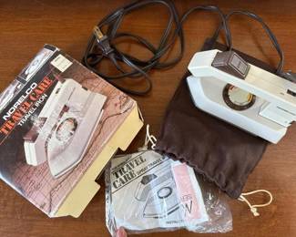 135 norelcoti65traveliron
