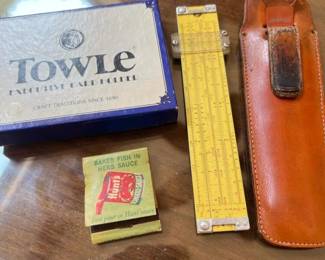 304 sliderulewithleathercasetowlebusin
