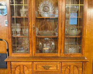 China hutch and many glass pieces 