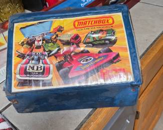There are 2 cases full of matchbox vehicles