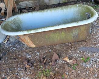 Bathtub from 1880's. Cast iron feet are not attached but are there