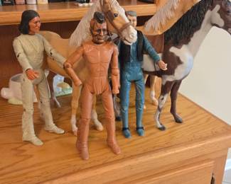 These are vintage toys by Marx - Johnny West, Geronimo, horses and lots of accessories