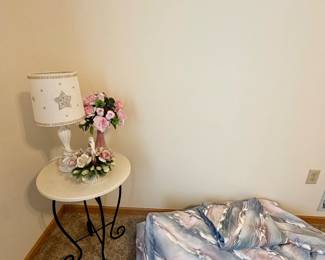 Pair of marble side tables, lamp, and king size bedding