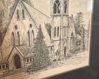 Framed Church Pen & Ink — Framed pen-and-ink drawing depicting a stone church with tower, matted in dark blue and set in a gilt wooden frame. The ink sketch shows detailed linework of windows, trees and entryway; framed under glass and ready to hang in a bathroom or hallway. Overall framed size approximately 18 x 18 inches with a visible art area of about 10 x 10 inches (measurements estimated). In good condition with minor age wear to the frame and mat; glass intact and artwork appears stable.